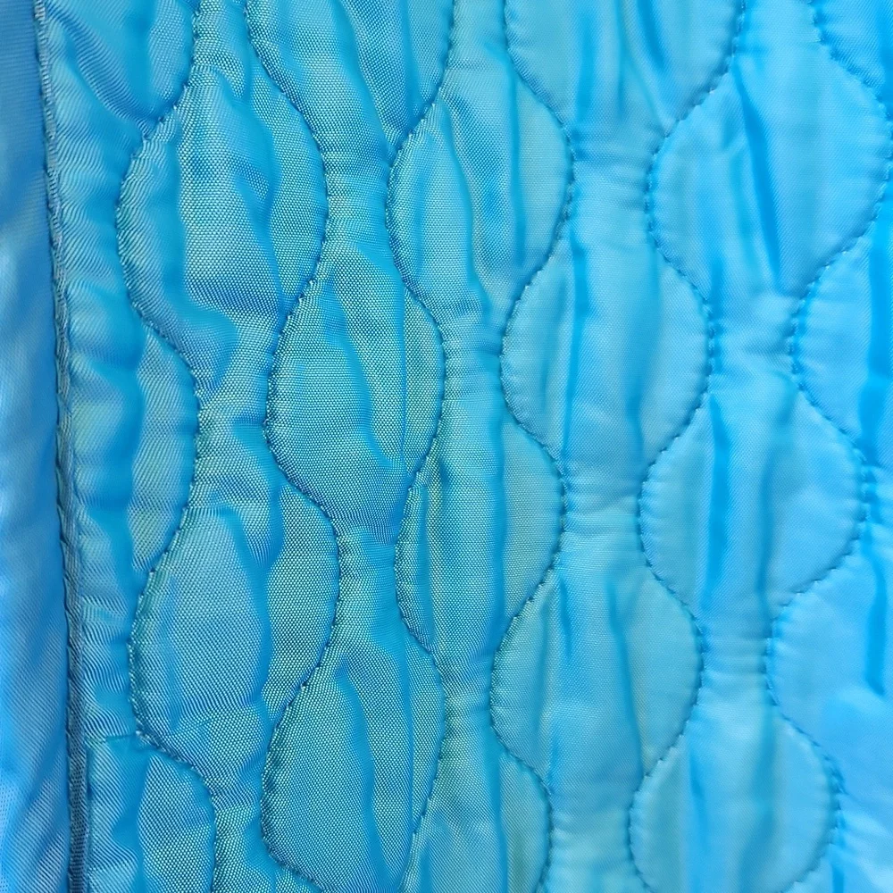 Vintage 1990s blue satin quilted twin size comforter bedspread .